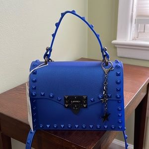 Most Wanted USA Small blue rockstar handbag, new with tags